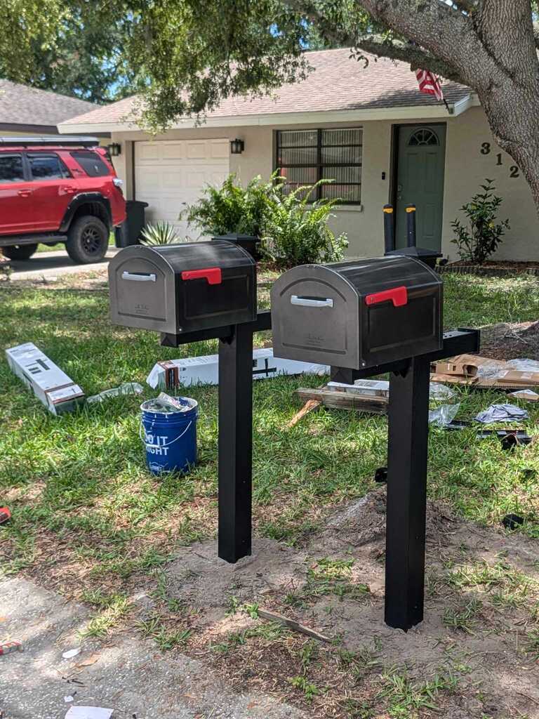 Mailbox installation by Fix It Once Handyman Services — Dual mailbox post set in concrete